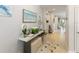 Inviting hallway with stylish decor, wood floors, and plenty of natural light at 1382 Foltz Loop, Oakland, FL 34787