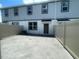 Pavered backyard with a privacy fence, perfect for outdoor activities and entertaining at 1411 Mount Royal Dr, St Cloud, FL 34771