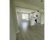 Bright space featuring a modern kitchen with white cabinets, stainless appliances, and an inviting layout at 1411 Mount Royal Dr, St Cloud, FL 34771