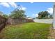 Backyard featuring well-maintained lawn, and privacy fencing at 1413 Brookebridge Dr, Orlando, FL 32825