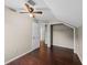 Bedroom featuring wood floors, neutral walls, an alcove closet and a ceiling fan at 1413 Brookebridge Dr, Orlando, FL 32825