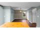 Bright dining area with hardwood floors, a modern chandelier, and ample natural light at 1413 Brookebridge Dr, Orlando, FL 32825