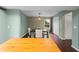 The dining room features hardwood floors, neutral paint, four chairs, and a decorative light fixture at 1413 Brookebridge Dr, Orlando, FL 32825