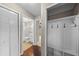 Hallway showcases well-organized closets and provides access to the bathroom at 1413 Brookebridge Dr, Orlando, FL 32825