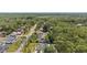 Neighborhood aerial view highlighting the lush tree coverage and nearby homes at 14612 Bray Rd, Orlando, FL 32832