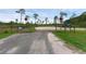Community entrance with the Isle of Pine Preserve sign and a split rail fence and gate at 14612 Bray Rd, Orlando, FL 32832