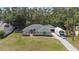Charming single story home with arched entryway and large canopy to the side at 14612 Bray Rd, Orlando, FL 32832