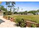 Side exterior view showing brick accents and tidy neighborhood at 14612 Bray Rd, Orlando, FL 32832