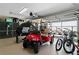 Clean and organized garage space with ample storage and room for a golf cart and bikes at 14612 Bray Rd, Orlando, FL 32832