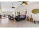 Living room featuring tile floors, ceiling fans, recessed lights and an open floor plan at 14612 Bray Rd, Orlando, FL 32832