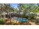 Enjoy outdoor living with this home featuring a screened-in pool, perfect for relaxation and entertainment at 14612 Bray Rd, Orlando, FL 32832
