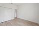 Bedroom with closet and neutral paint ready for personalization and comfort at 14930 Sw 66Th Ave Rd, Ocala, FL 34473