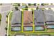 Aerial view showcasing the property's location with a screened-in pool, surrounded by neighboring houses and a nearby street at 1505 Nassau Point Trl, Kissimmee, FL 34747