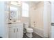 Well-lit bathroom features a shower-tub combo, vanity, and modern fixtures at 1505 Nassau Point Trl, Kissimmee, FL 34747