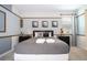 Themed bedroom with unique decor, a ceiling fan, and modern furnishings at 1505 Nassau Point Trl, Kissimmee, FL 34747