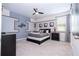 Themed bedroom with unique decor, a ceiling fan, and modern furnishings at 1505 Nassau Point Trl, Kissimmee, FL 34747