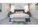 Well-lit bedroom showcasing neutral décor and carpet, enhanced by elegant furnishings for a serene space at 1505 Nassau Point Trl, Kissimmee, FL 34747