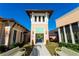 Clubhouse at Solara Resort with attractive landscaping and seating at 1505 Nassau Point Trl, Kissimmee, FL 34747
