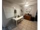 Bright dining area featuring tile floors, a dining table, and a stylish sideboard at 1511 Hobson St, Longwood, FL 32750