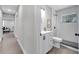 An updated bathroom with a new vanity and modern subway tile shower at 1533 Fort Smith Blvd, Deltona, FL 32725