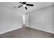 This bedroom features wood floors, a ceiling fan, and neutral walls at 1533 Fort Smith Blvd, Deltona, FL 32725