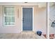Close-up of front door with address numbers, modern hardware, and a welcoming entrance at 1533 Fort Smith Blvd, Deltona, FL 32725