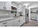 Bright kitchen with stainless steel appliances, stone countertops, and lots of cabinet storage at 1533 Fort Smith Blvd, Deltona, FL 32725