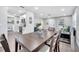 Open-concept living area with updated flooring, neutral colors, and abundant natural light at 1533 Fort Smith Blvd, Deltona, FL 32725