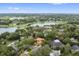 Beautiful aerial view of the neighborhood showcasing the surrounding greenery and scenic lake nearby at 1542 Islay Ct, Apopka, FL 32712