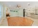 Spacious living room features a fireplace, ample natural light, and hardwood flooring at 1542 Islay Ct, Apopka, FL 32712