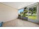View from a screened porch of the landscaped yard at 1543 Club Cir, Lakeshore, FL 33854