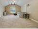 Spacious bedroom with a sloped ceiling, a trundle bed and a large window with shutters at 1874 Royal Majesty Ct, Oviedo, FL 32765