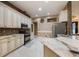 Well-appointed kitchen with stainless steel appliances, granite countertops, and custom cabinetry at 1874 Royal Majesty Ct, Oviedo, FL 32765
