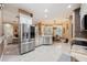 Updated kitchen with stainless steel appliances and adjoining dining area at 1874 Royal Majesty Ct, Oviedo, FL 32765