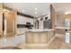 Bright kitchen with a marble island and access to dining and living areas at 1874 Royal Majesty Ct, Oviedo, FL 32765