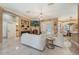 Elegant living room featuring a fireplace, French doors, and light-filled ambiance at 1874 Royal Majesty Ct, Oviedo, FL 32765
