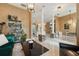 Open-concept living area with elegant columns and lots of light at 1874 Royal Majesty Ct, Oviedo, FL 32765