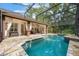 Beautiful pool with screened-in enclosure and spacious outdoor area at 1874 Royal Majesty Ct, Oviedo, FL 32765