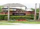 Bristol Grande community entrance with brick signage and landscaping at 2237 Osprey Woods Cir, Orlando, FL 32820