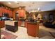 Well-equipped kitchen featuring stainless steel appliances, a center island, and an open layout at 2237 Osprey Woods Cir, Orlando, FL 32820