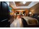 Main bedroom features an office area and a tv, offering an open layout and great decor at 2237 Osprey Woods Cir, Orlando, FL 32820