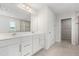 Bathroom features a double sink vanity, tile floors, and large walk-in shower at 2431 Tudor Rose Dr, Sanford, FL 32773