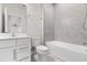 Modern bathroom with tiled shower, white vanity, and chrome fixtures at 2431 Tudor Rose Dr, Sanford, FL 32773