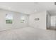 Large bedroom with two windows and pre-mounted TV bracket at 2431 Tudor Rose Dr, Sanford, FL 32773