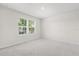 Bright bedroom features a large window that lets in natural light at 2431 Tudor Rose Dr, Sanford, FL 32773