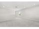 Empty living room area with access to other rooms at 2431 Tudor Rose Dr, Sanford, FL 32773