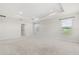 Large main bedroom with a tray ceiling and ensuite bathroom at 2431 Tudor Rose Dr, Sanford, FL 32773