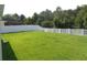 Spacious, fenced backyard with lush green lawn at 2451 Strandhill St, Orlando, FL 32824