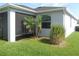 Home's exterior shows fenced yard with well-manicured lawn at 2451 Strandhill St, Orlando, FL 32824