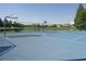 Outdoor community basketball court overlooks the lake at 2451 Strandhill St, Orlando, FL 32824